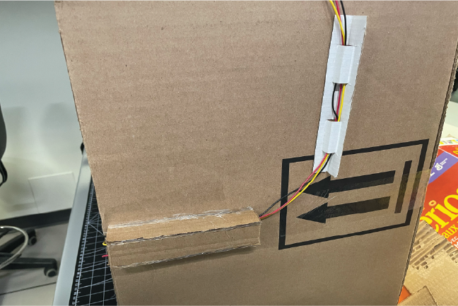 I had the wires for the light run up the side of the sensory room and into the top of the box.